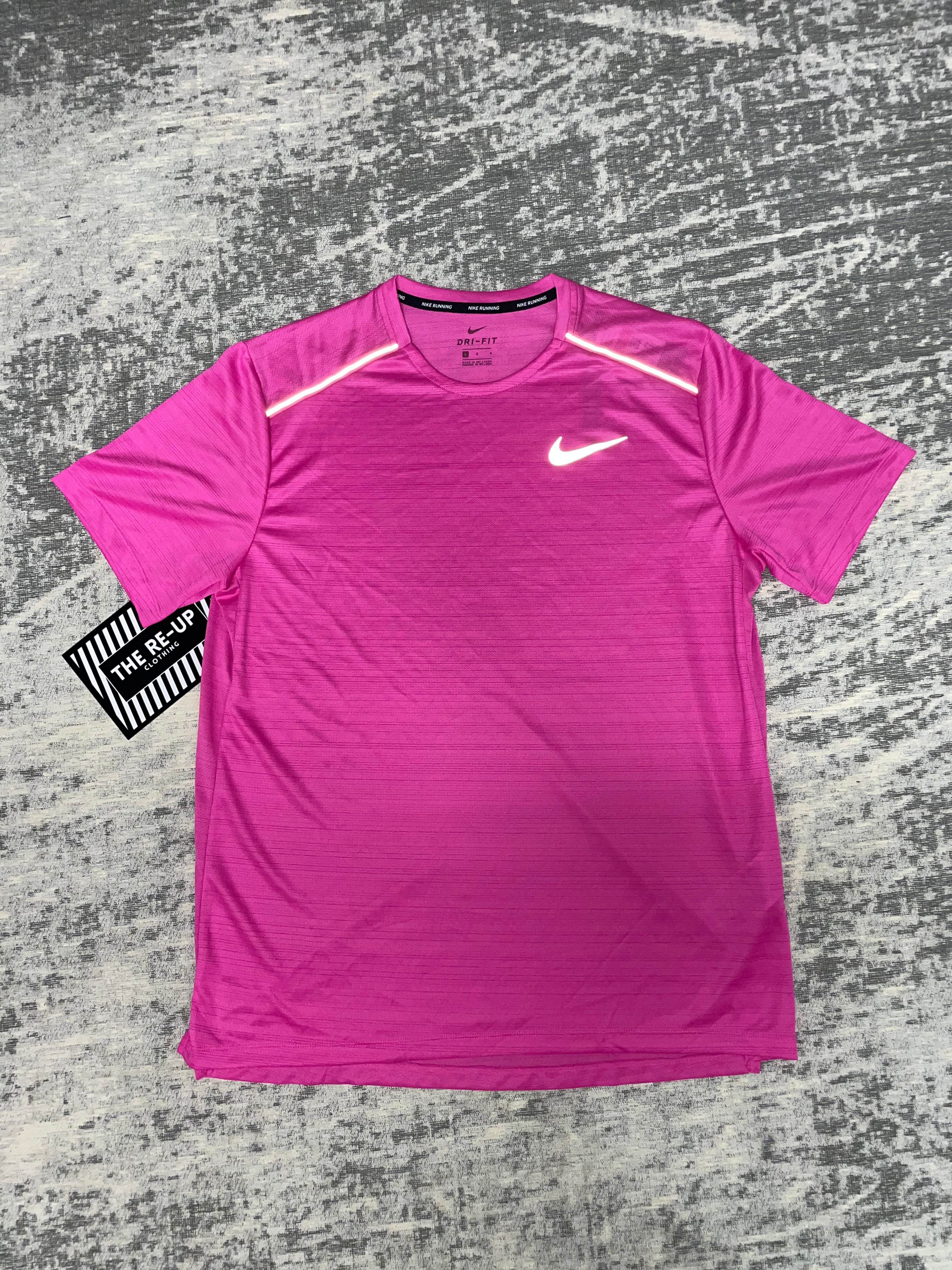 Fuchsia pink nike clearance shirt